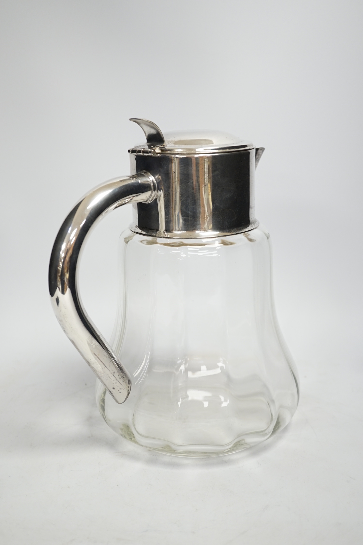 A silver plated mounted lemonade jug, 27cm high